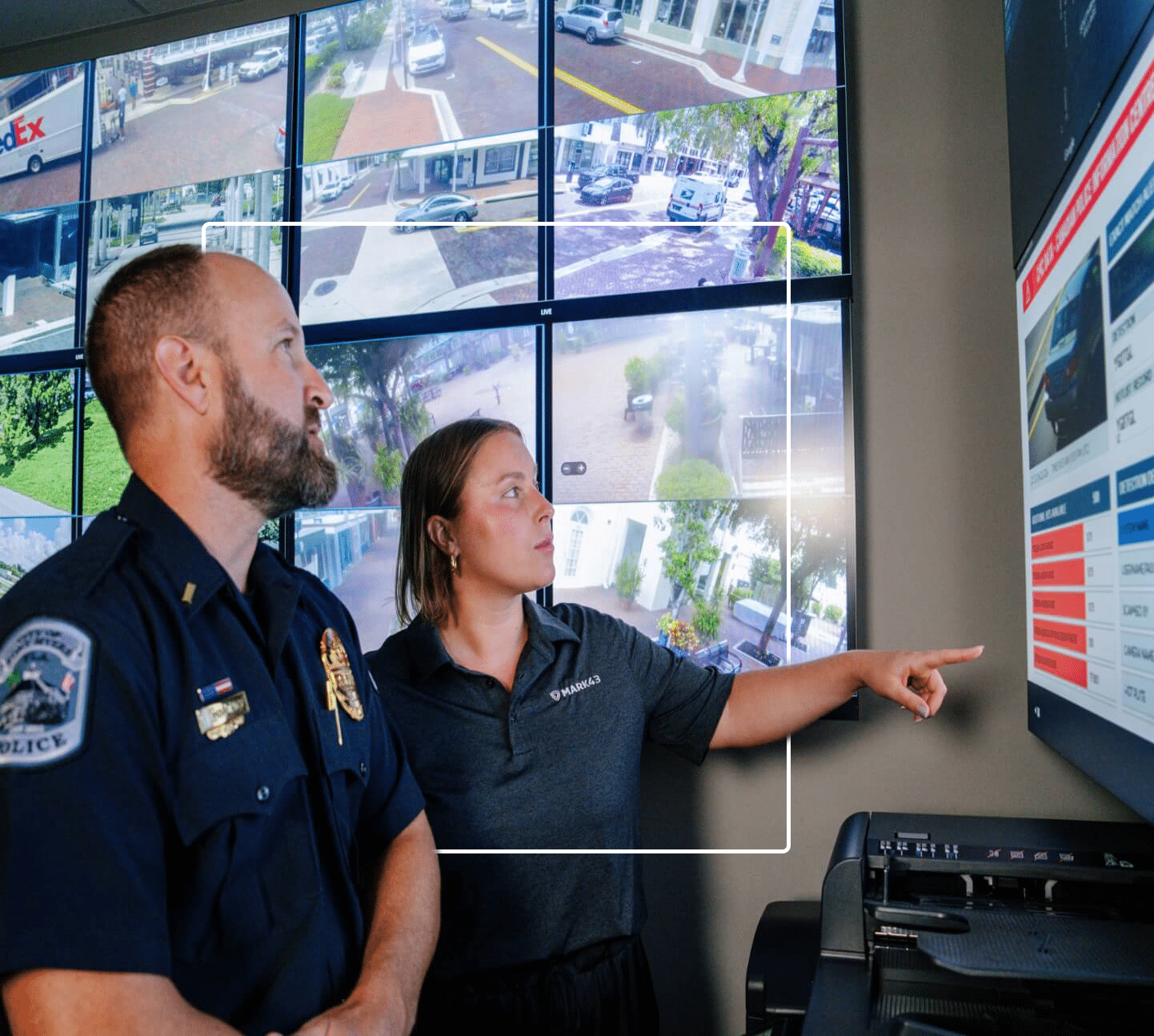 a police officer working with a Mark43 team member