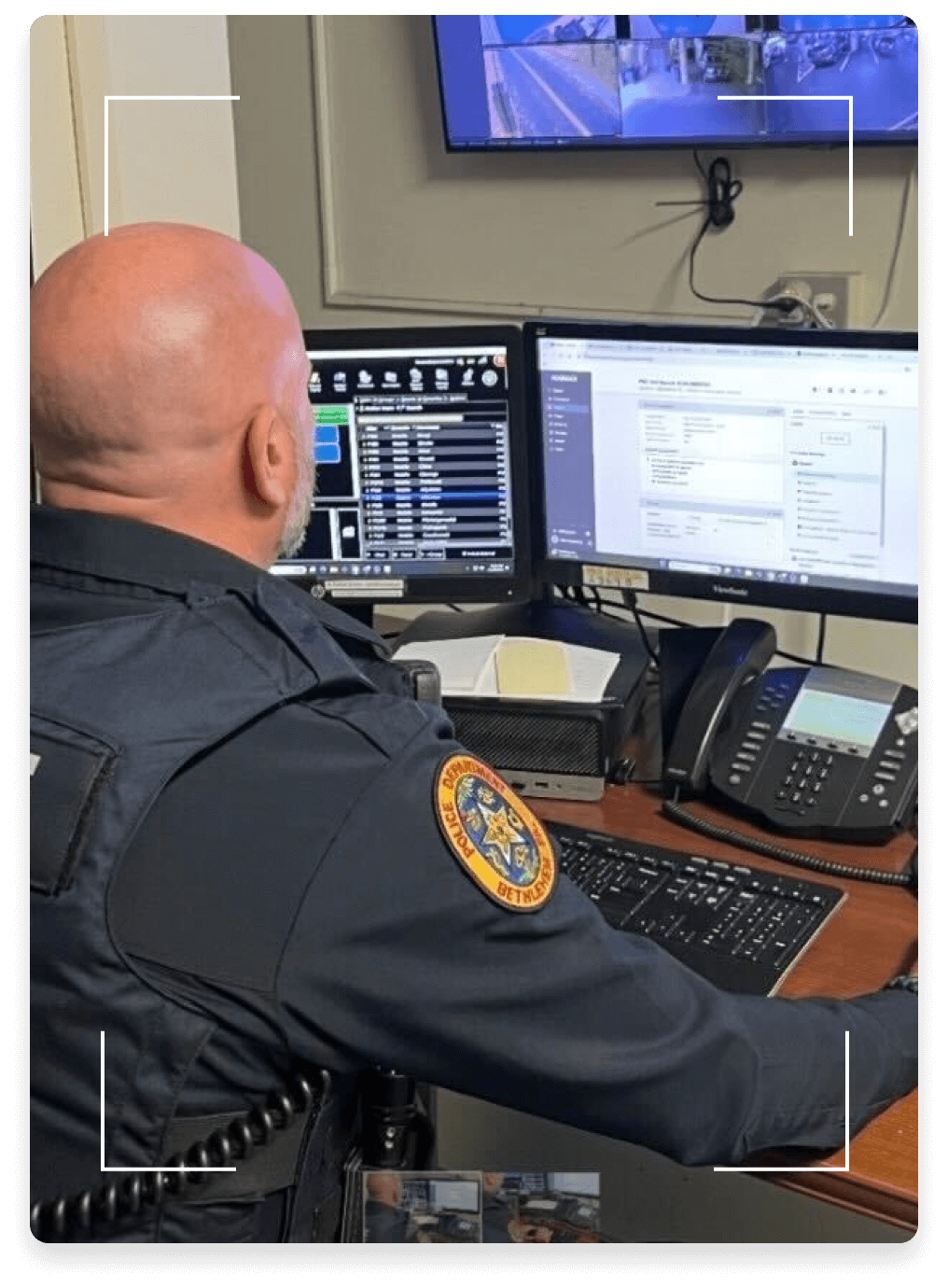 police officer working on his computer