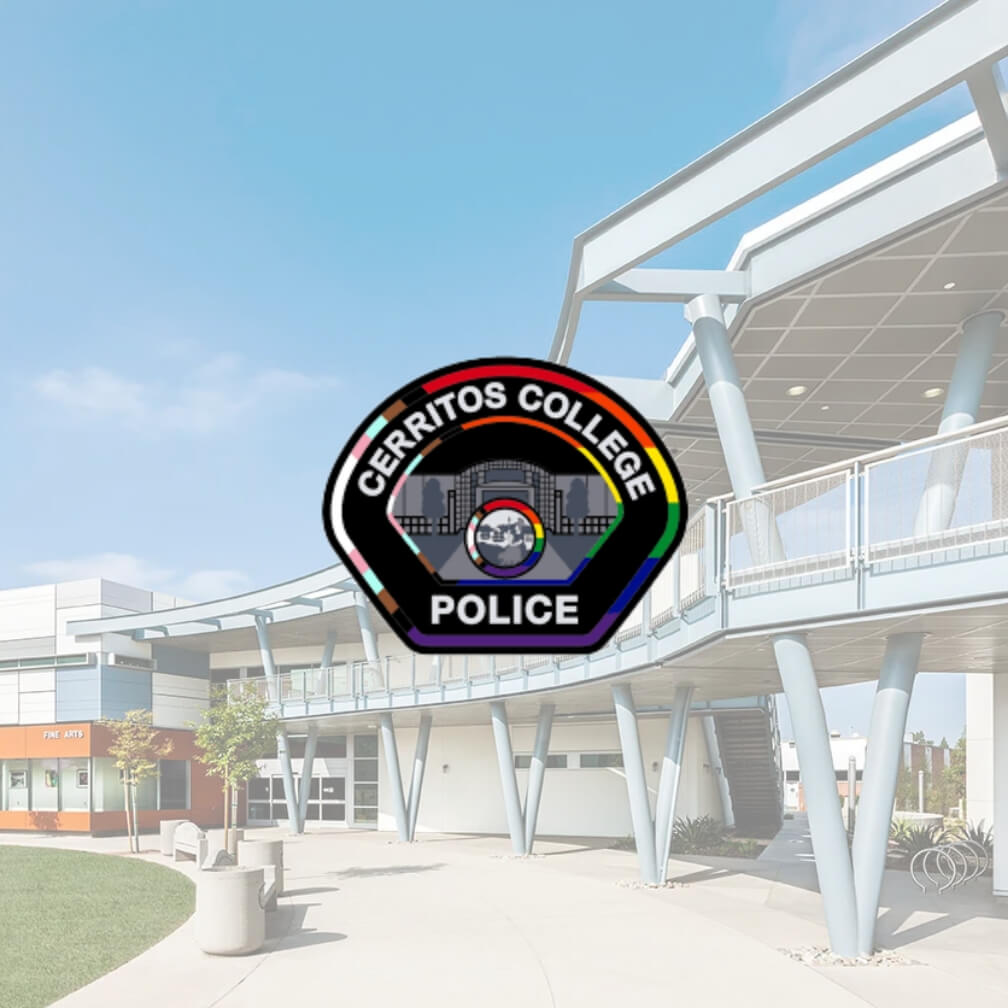 Cerritos College police badge and the cityscape behind it