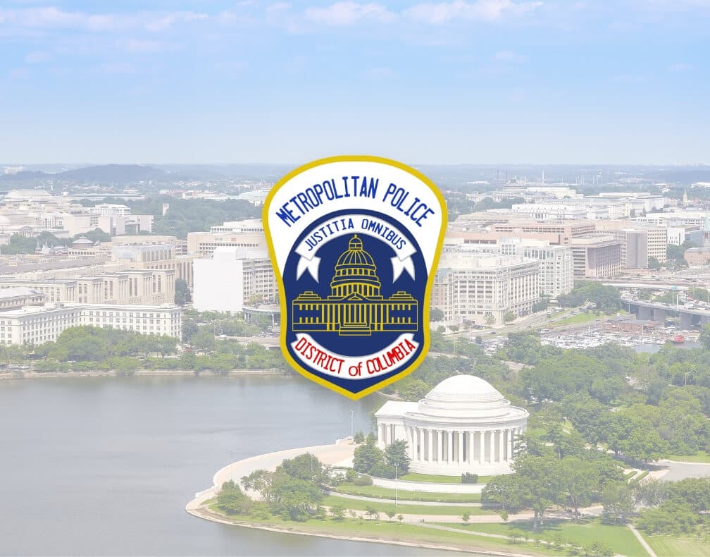 District of Columbia police badge and the cityscape behind it